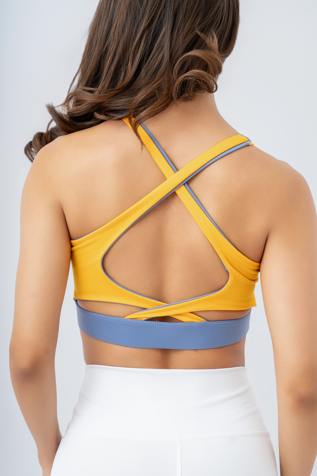 TOP CROSSED BICOLOR CELESTE OSCURO + MOSTAZA